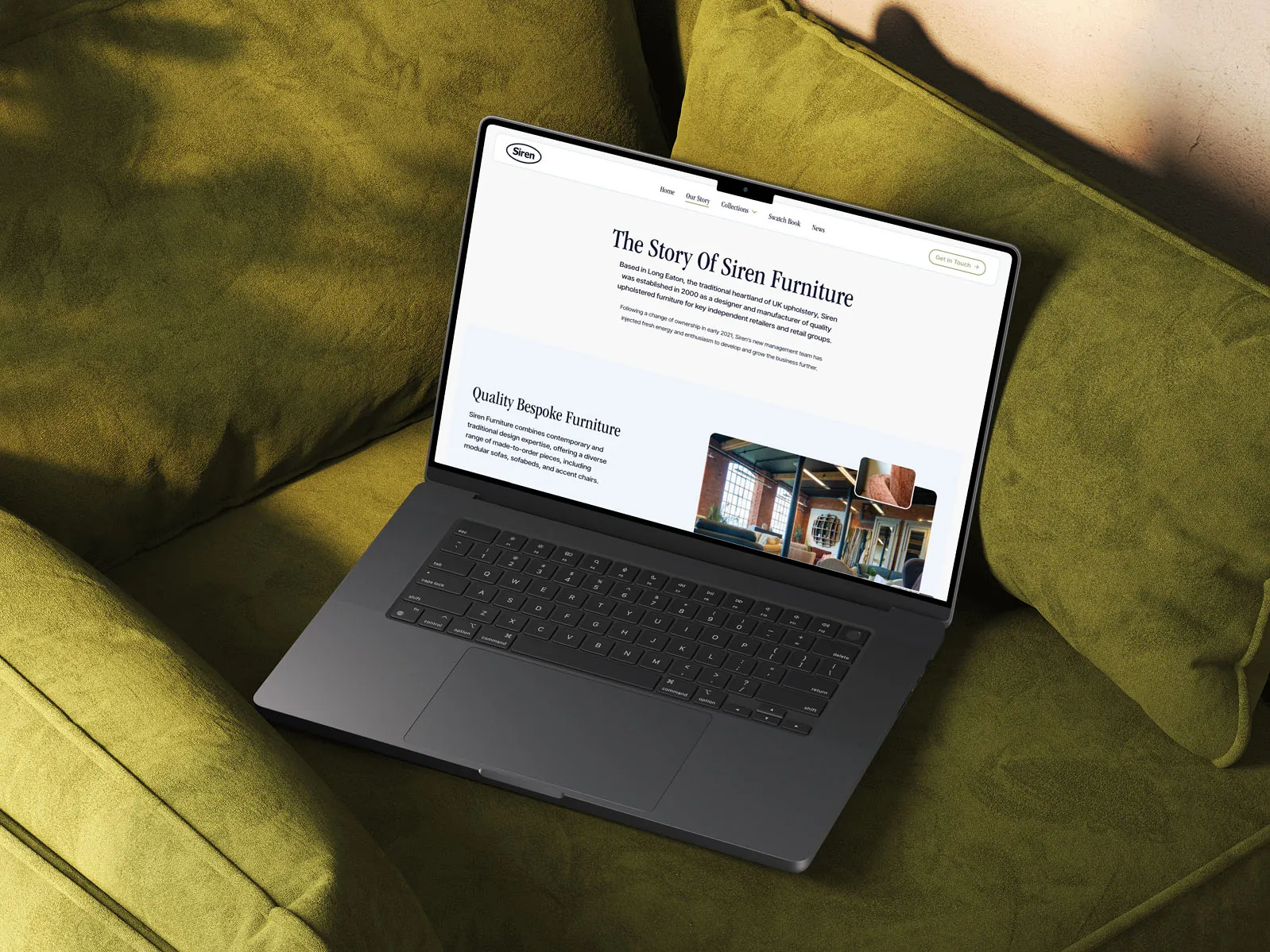 The Siren Furniture website on a laptop resting on a green sofa